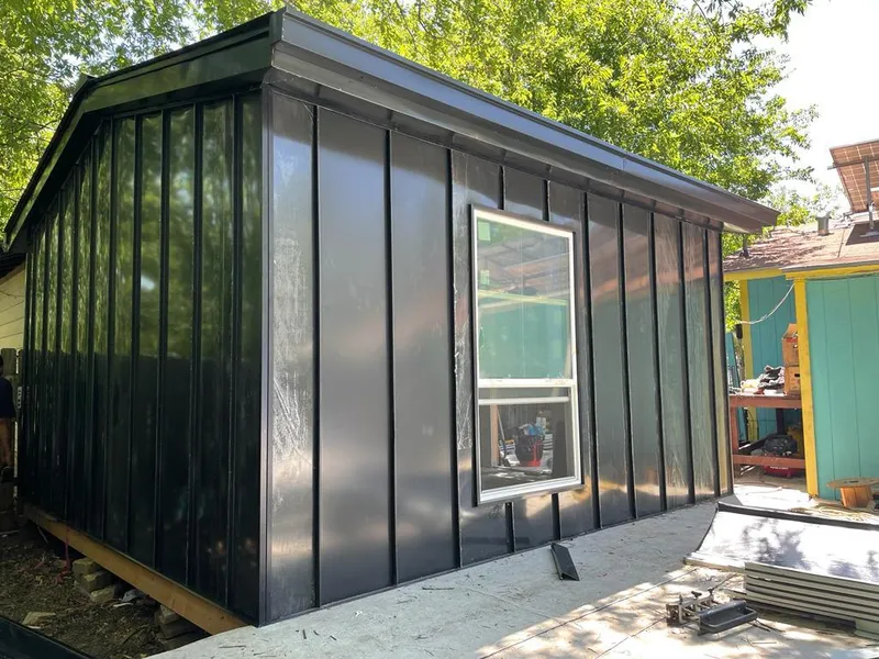 Black standing seam metal wall panels for Roof Inspection in Normandy Park