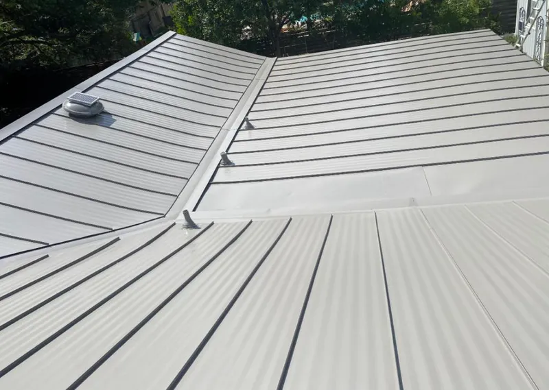 Solar attic fan installed on a metal roof for Roof Ventilation in Normandy Park